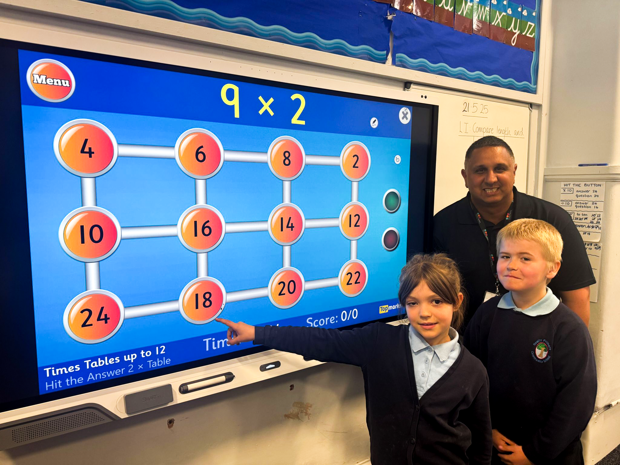 Sukhraj and kids with whiteboard (edit)